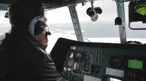 The pilot controls the helicopter Stock Footage 58474926