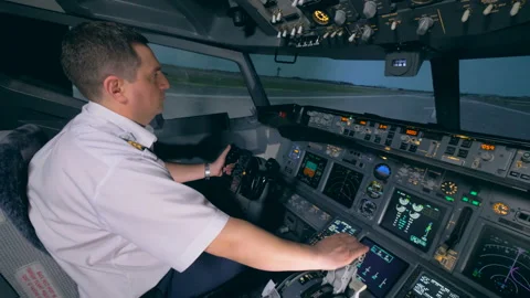 A pilot controls a plane on a runway. Video stock 88538717