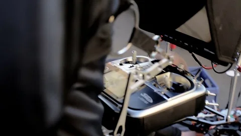 The pilot of the Copter fastens his control panel. Stock Footage 75826080