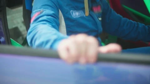 Pilot driver closes car door and puts his hands on the steering wheel Stock Footage 130382130