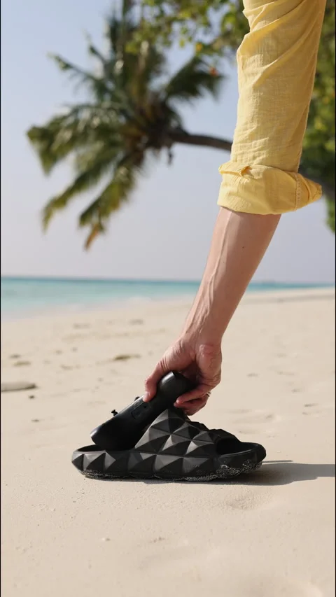 The pilot of the drone picks up the controller. Vertical footage Stock Footage 260340226