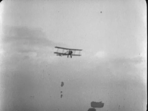 Pilot drops bomb during air raid, WW1, 1918 Stock Footage 133388398