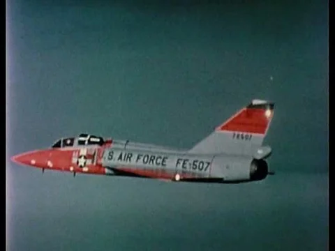 A pilot ejects from his plane and parachutes safely. 動画素材 75760131