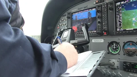 Pilot Fills Flight Log Before Taking Off 스톡 동영상 102133742