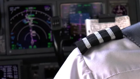 Pilot in the flight deck of a modern airliner. Stock Footage 144136069