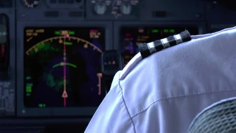 Pilot in the flight deck of a modern airliner. Stock Footage 146134666