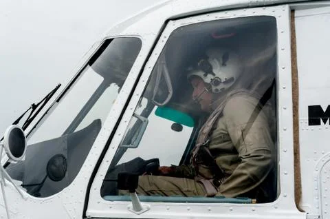 Pilot before flight in MI-8 helicopter Stock Photos