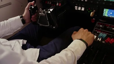 Pilot flight simulator with his hands on the steering wheel. The flight of the Stock Footage 208628891