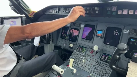 Pilot flying a moder jet, side view. Cap... | Stock Video | Pond5