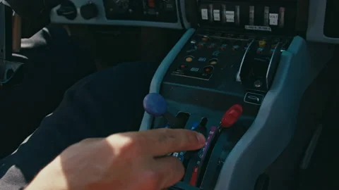 Pilot hand move power stick while controlling small single-engine plane Stock Footage 203825967