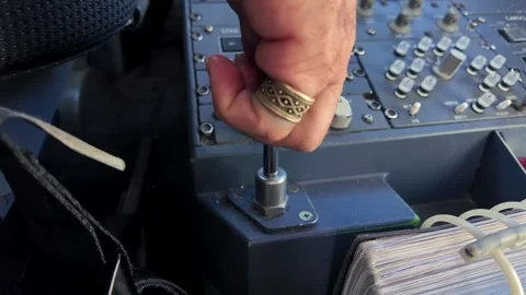 Pilot Hand Pulling the Parking Brake Lever in a Modern Jet Airplane. Stock Footage 347934321