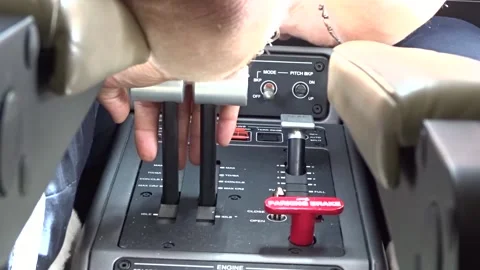 Pilot hand on throttle take off departure airplane aircraft modern Stock Footage 227888514