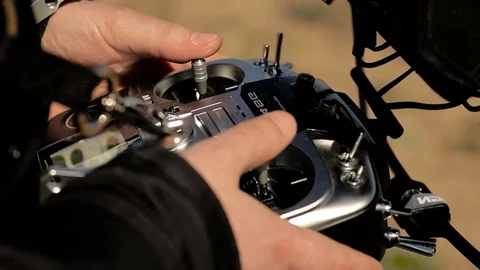 Pilot hands control joysticks on the control panel. Stock Footage 75826245