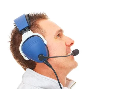 Pilot with headset looking aside Stock Photos
