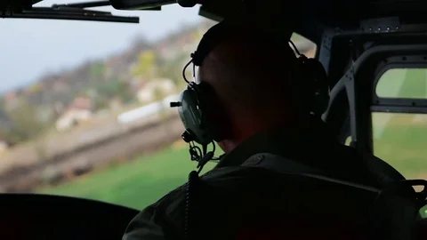Pilot helicopter in flight Stock Footage 85456485