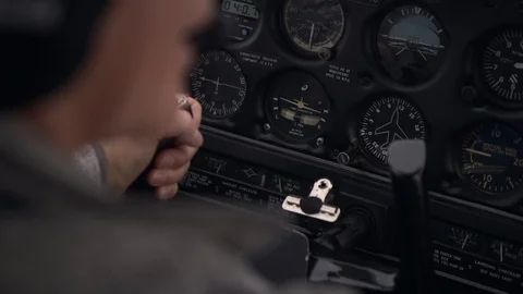 Pilot holding Yoke in Small Plane, Instrument Close Up Stock Footage 99267591