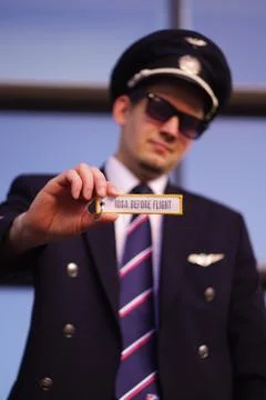 Pilot holds a keychain Stock Photos