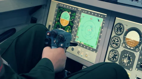 Pilot by joystick controls the helicopter, airplane or other flying means Stock Footage 68354081
