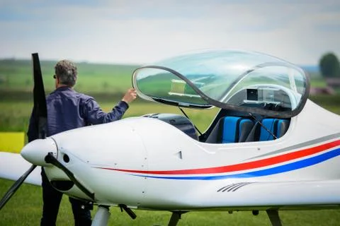Pilot leaving the cockpit Stock Photos
