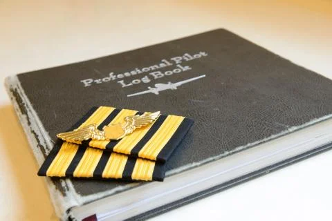 Pilot log book and  pilot sign. Stock Photos