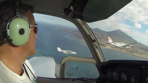 Pilot looking over planes Stock Footage 260578345
