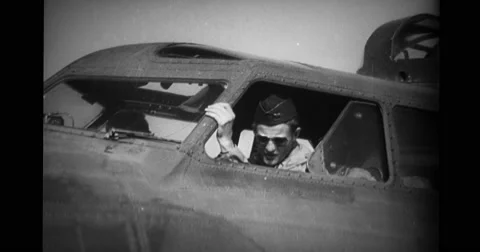 Pilot looking through the window of military aircraft Stock Footage 43438967
