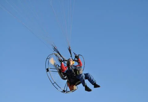 Pilot of the motor paraplane flying 写真素材