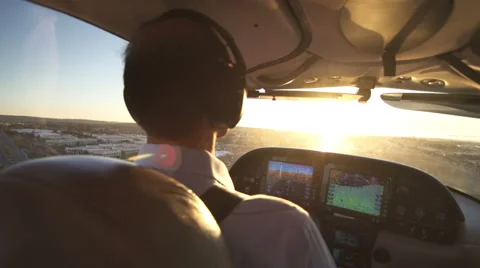 Pilot Navigating A Small Private Plane At Sunset View Stock Footage 58801097
