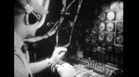 Pilot operating the control panel of the aeroplane Stock Footage 39912948