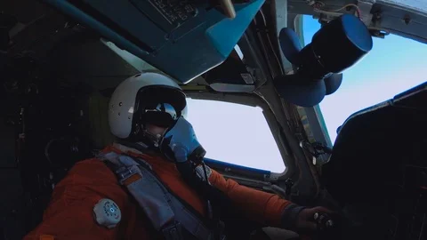 The pilot in an orange jumpsuit Stock Footage 119123626