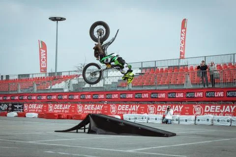 Pilot performs a backflip at eicma 2013 in milan, italy Stock Photos