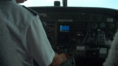 Pilot on plane and navigating Stock Footage