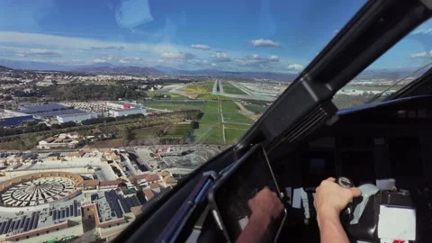 Pilot POV in the Final Approach to Malaga Airport (AGP) in a Bright and Sunny Stock Footage 328296669