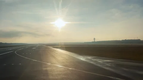 Pilot pov from plane taking possition at runway before take off at sunset, su Stock Footage 284839984