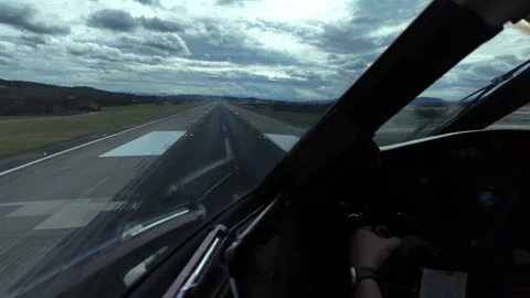 Pilot POV in a Real Time Landing in a Windy and Cloudy Day, Runway 14. Stock Footage 334142607