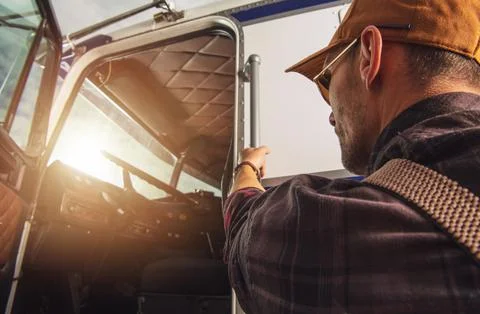 Pilot Preparing for Flight in a Small Aircraft During Sunset Stock Photos