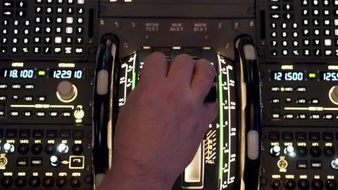 Pilot pressing on taking off button with illuminated dashboard inside a flight s Video stock 237084683