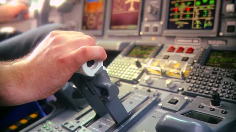 Pilot push thrust lever handle for takeoff a plane in the cockpit Stock Footage 51571527