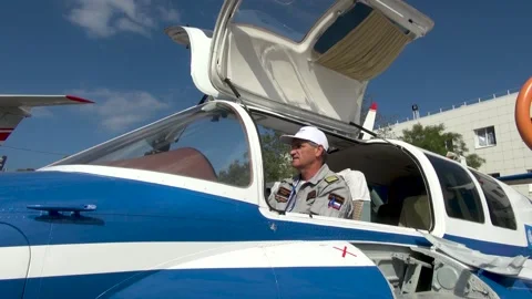 Pilot sits in cockpit of Be-103  light amphibious aircraft (flying boat). Stock Footage 135318974