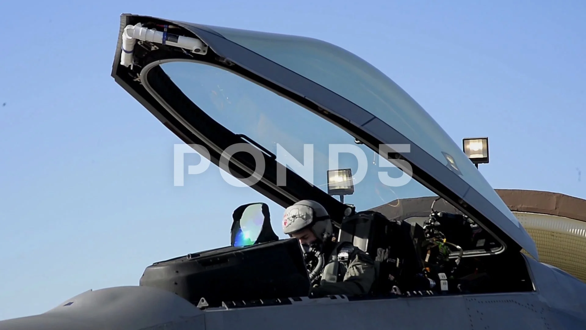 Pilot Sitting In Cockpit Of F 22 Raptor With Canopy Open Clip