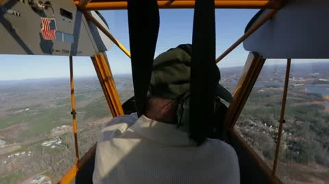 Pilot in small plane Stock Footage 22100405