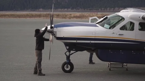 Pilot Spinning Propellors On Small Plane Stock Footage 81793129