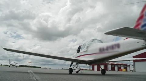 Pilot Standing on Airplane Wing Stock Footage