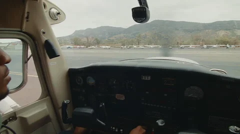 Pilot starting up small plane Video stock 60270281