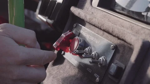 The pilot starts the car engine Stock Footage 88509491