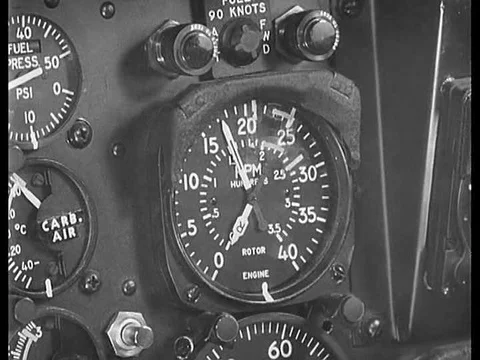 A pilot starts the engine of the h-19 helicopter in pre flight checks at the Video stock 75760106