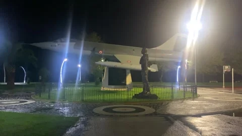 Pilot Statue and Large Model Aircraft at Night Video stock 347778996