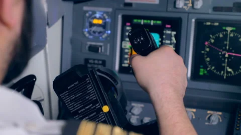 A pilot steers a helm, close up. Stock Footage 88540320