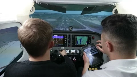 Pilot training on a light aircraft simulator Video stock 223468304