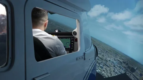 Pilot training on a light aircraft simulator Video stock 223468395
